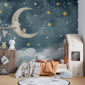 Night sky wallpaper in cozy nursery with soft lighting showing moon and stars design