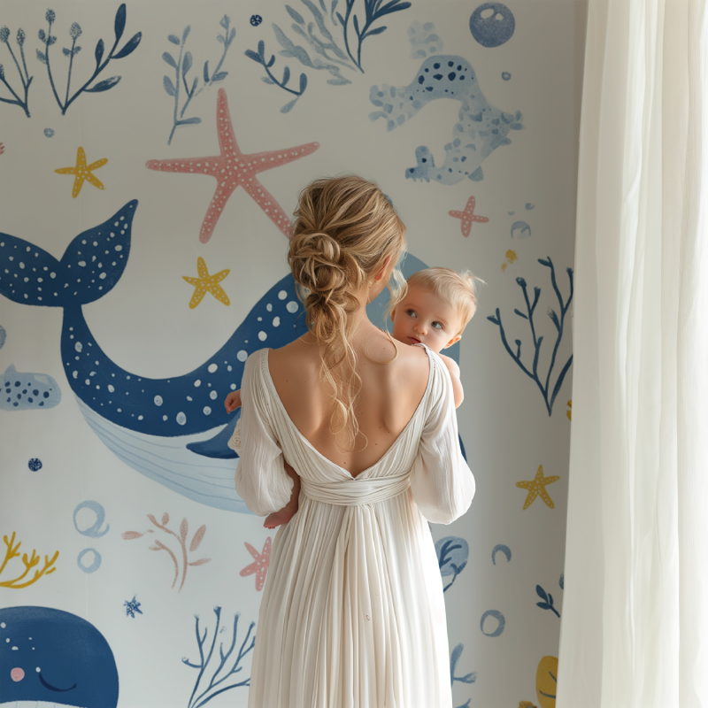 Playroom showing ocean mural wallpaper with cute sea creatures in soft colors