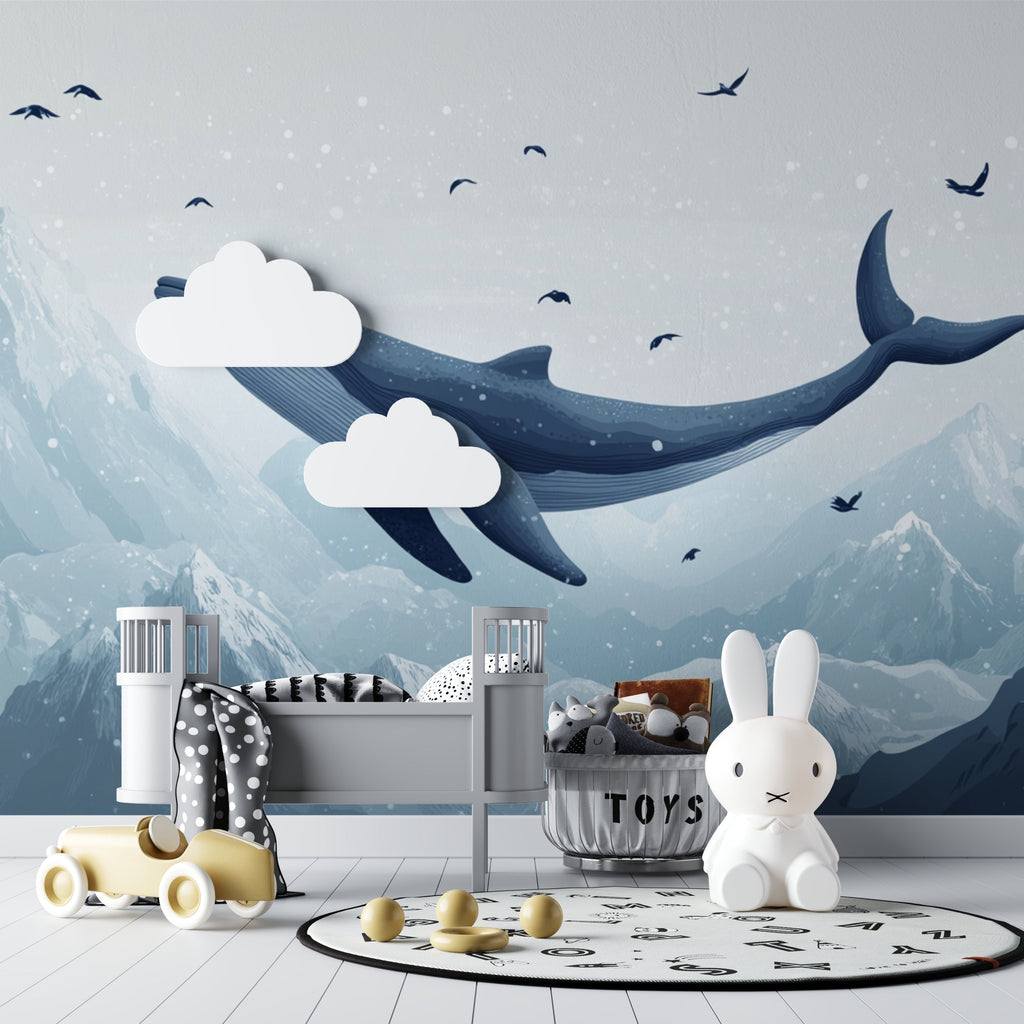 Marine animal wallpaper brightening up a child's bedroom with mountain and whale theme