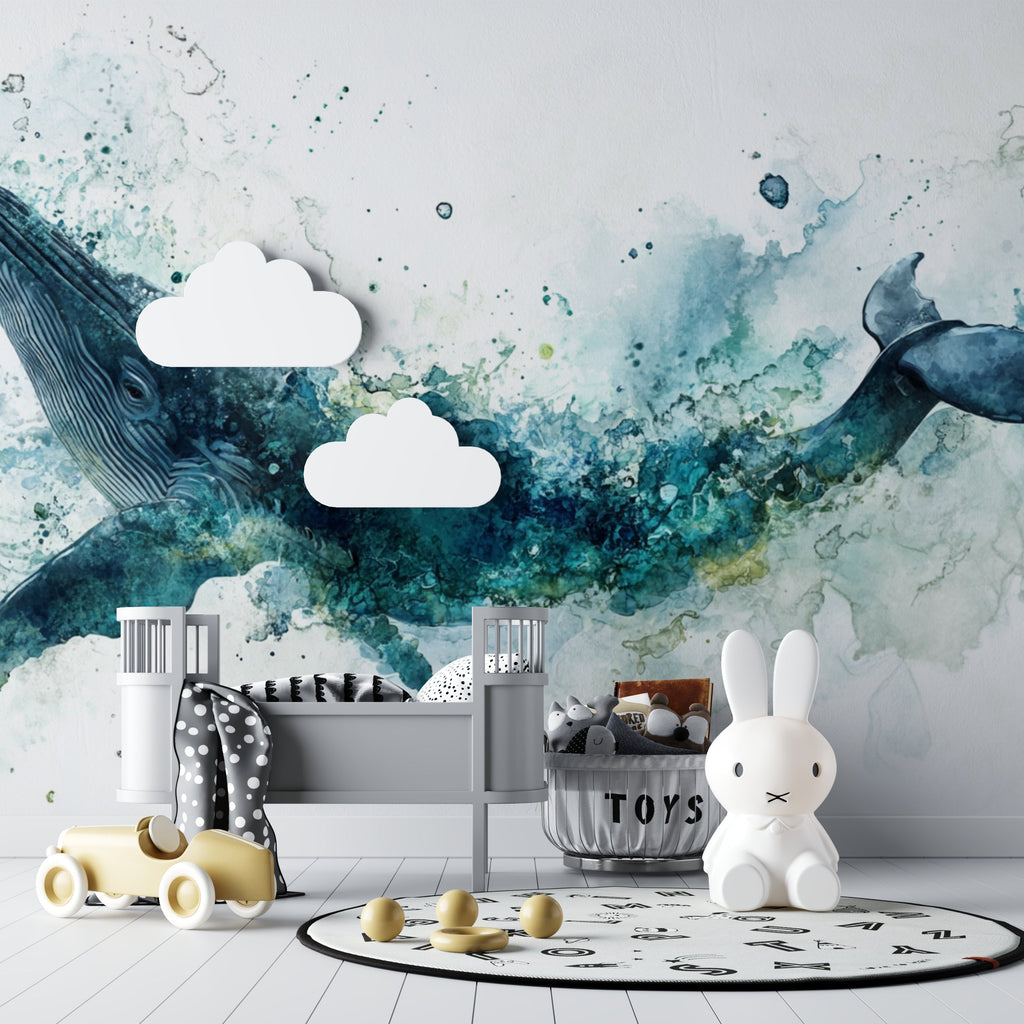Whale wall mural displayed in cozy kids bedroom, showing scale and dreamy watercolor effect