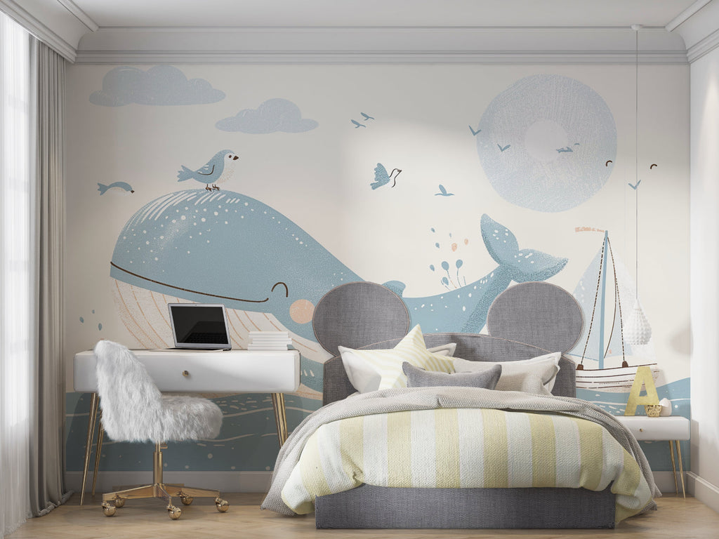 Ocean wallpaper featuring whale and sailboat bringing charm to bedroom walls