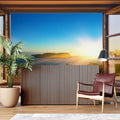 Ocean view window mural wallpaper creating depth in modern living room with grey sofa