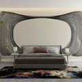 Modern office space featuring a striking Optical Illusion wallpaper with black curved lines creating depth on white background