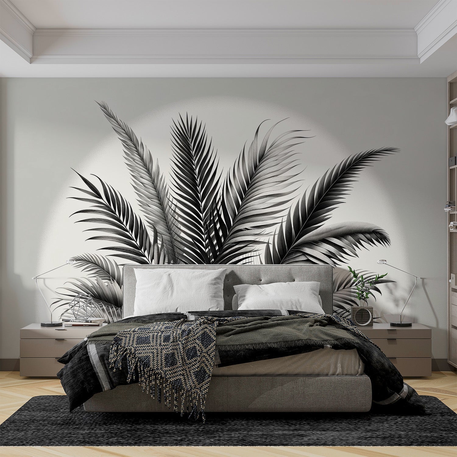 Black and white palm leaf wallpaper creating dramatic contrast in a modern living room with minimalist furniture