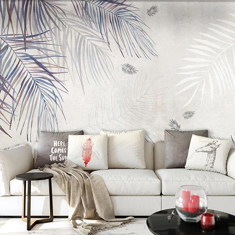 Watercolor palm leaf mural in bright bedroom with minimal decor