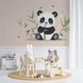 Panda wallpaper mural creating a cozy atmosphere in a modern nursery with white furniture