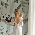 Panda wallpaper mural creating a peaceful atmosphere in a modern nursery with white furniture