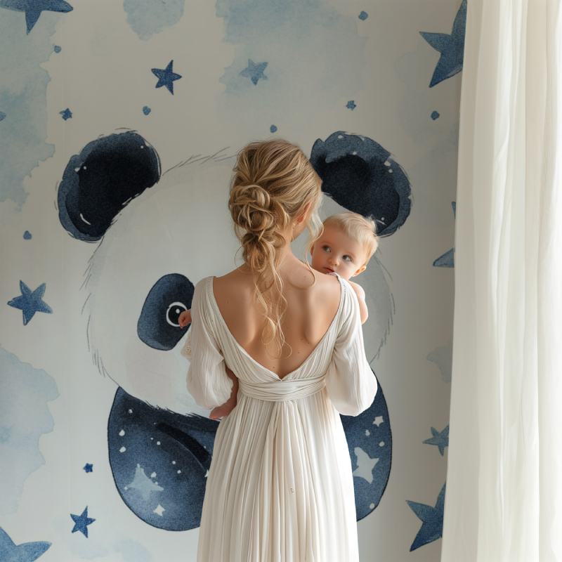 Panda wallpaper mural in a cozy nursery with soft lighting showing the starry night effect