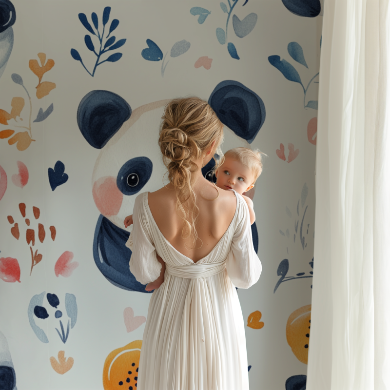 Baby room showing panda and floral wall mural with matching orange accessories