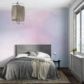 Pastel gradient wallpaper creating a serene atmosphere in a modern living room with minimalist furniture