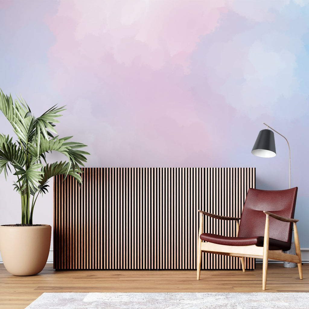 Pink and blue gradient mural in a cozy bedroom setting with natural light