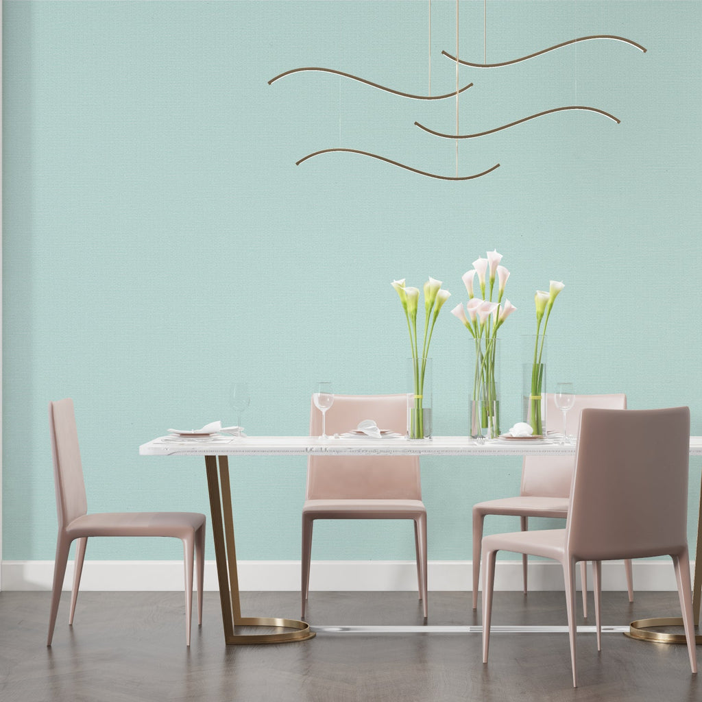 Fresh pastel wallpaper in home office with clean desk setup