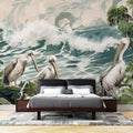 Pelican coastal wallpaper in bright modern living room with white furniture and natural light highlighting the ocean waves