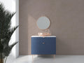 Elegant taupe bathroom wallpaper in modern master bath with freestanding tub and brass fixtures
