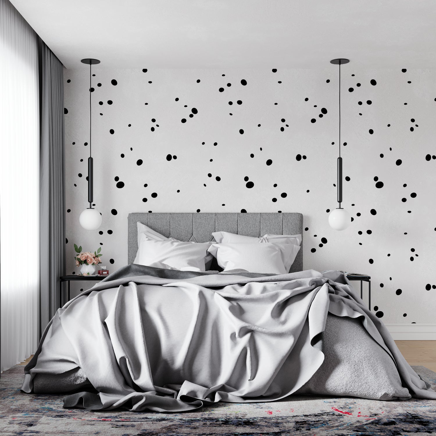 Black and white dot pattern wallpaper in a minimalist home office space