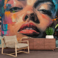 Modern portrait wallpaper showcased in a bright living room, creating a bold artistic focal point with vibrant colors