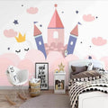 Princess castle wallpaper creating magic in a girl's bedroom with soft pink and blue tones