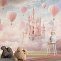 Princess castle wallpaper creating magic in a bright nursery, with soft pink hot air balloons floating across the wall