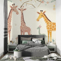 Safari giraffe wallpaper in a bright nursery with white furniture showing scale and peaceful atmosphere