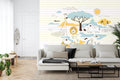 Safari Animals Wallpaper creating a cozy atmosphere in a modern nursery with white furniture