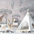 Safari nursery wallpaper with hot air balloons displayed in a bright, modern nursery with white furniture