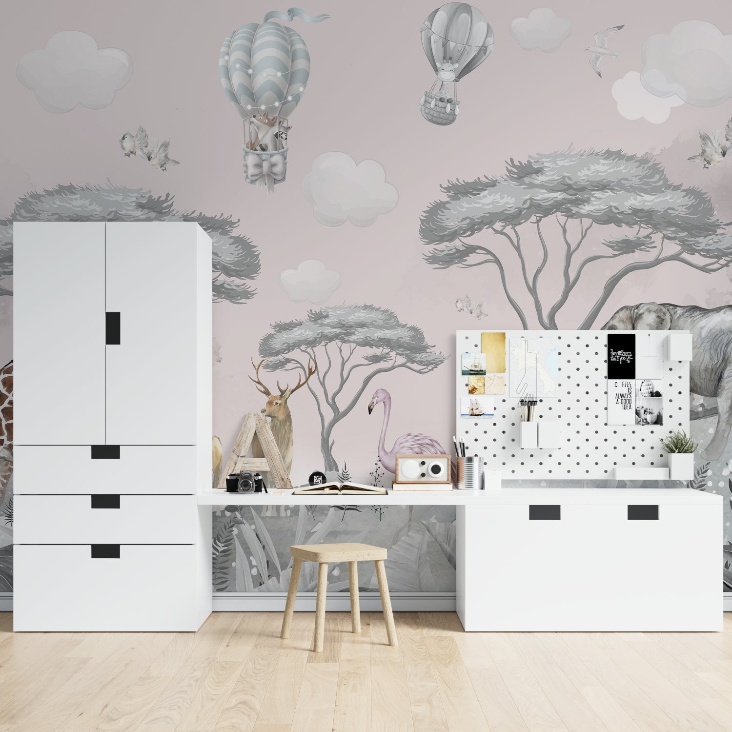 Safari nursery wallpaper with elephants and hot air balloons creating a dreamy atmosphere in a modern nursery