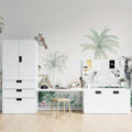 Safari animals wallpaper mural styled in a bright nursery with soft green accents and natural wood furniture