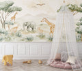 Safari animals wallpaper mural in cozy nursery with natural light showing gentle watercolor elephant and giraffe