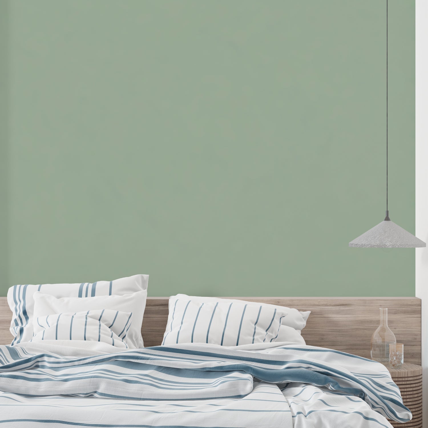 Home office featuring modern sage green wallpaper with minimal aesthetic