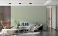 Sage green minimalist wallpaper in modern living room with natural light streaming through windows