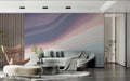 Dreamy watercolor sky mural in modern living room creating an airy, open feeling