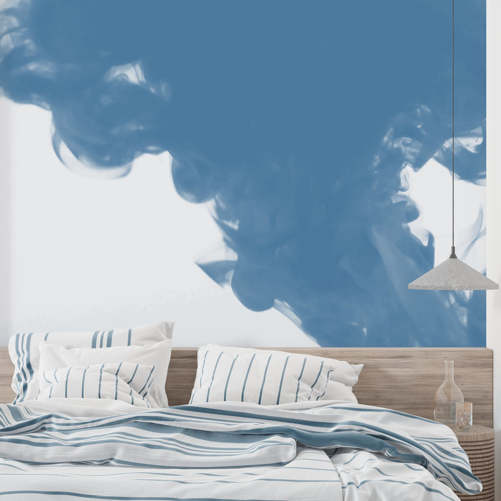 Blue sky mural creating airiness in a small reading nook