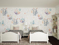 Space bunny wallpaper creating a magical atmosphere in a modern nursery with white furniture