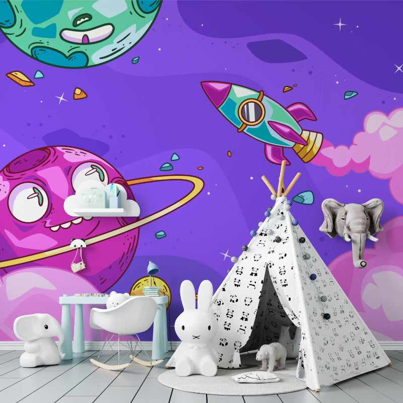 Reading nook with fun galaxy wallpaper creating a cozy space theme
