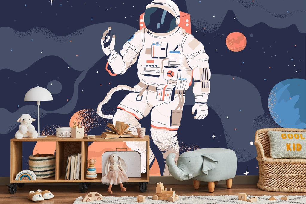 Playroom featuring space exploration wallpaper with navy and coral celestial theme