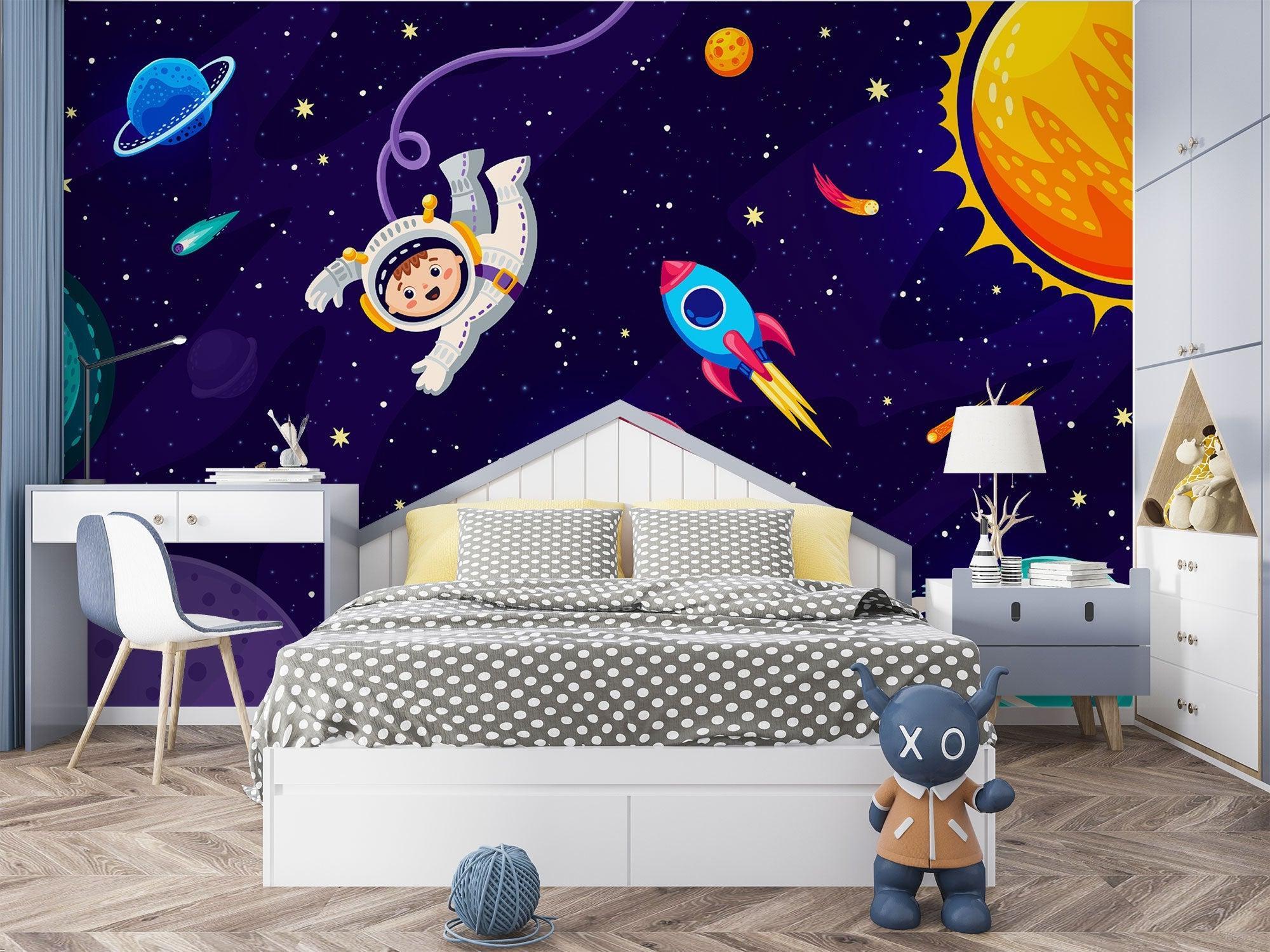 Astronaut wall mural brightening playroom with floating planets and stars