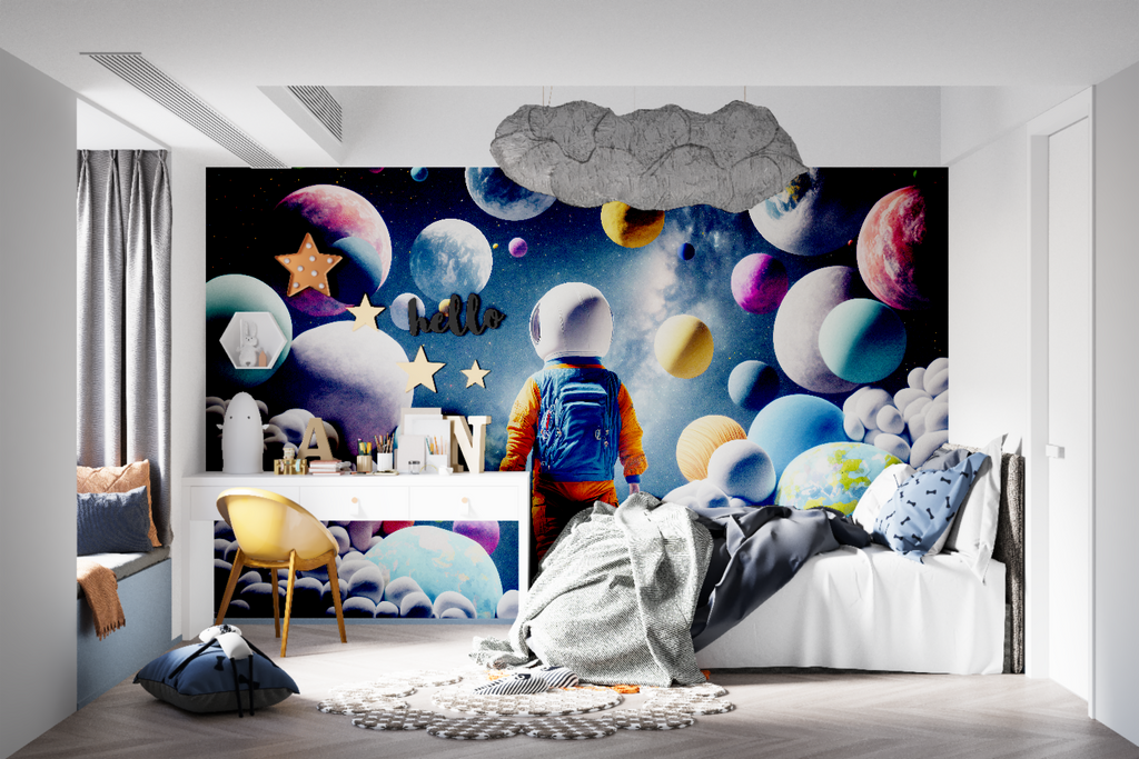 Space-themed wallpaper bringing color to nursery with rocking chair
