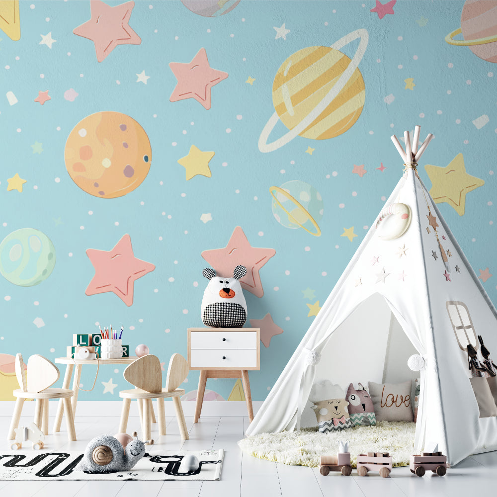 Kids bedroom featuring space mural wallpaper with pink and mint planets