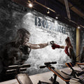 Boxing wallpaper displayed in modern home gym, showing dramatic black and white design