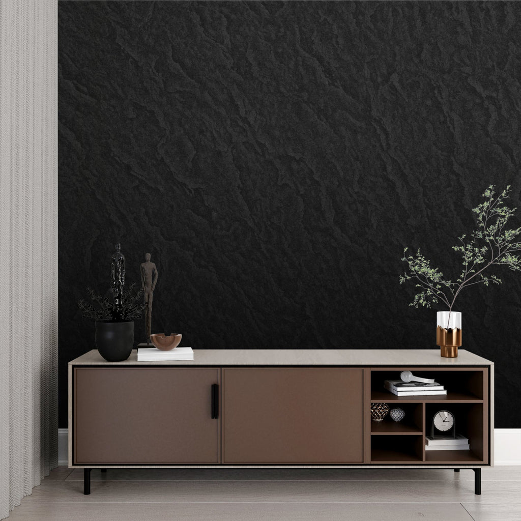 Textured black stone wallpaper creating drama in luxury home office setting