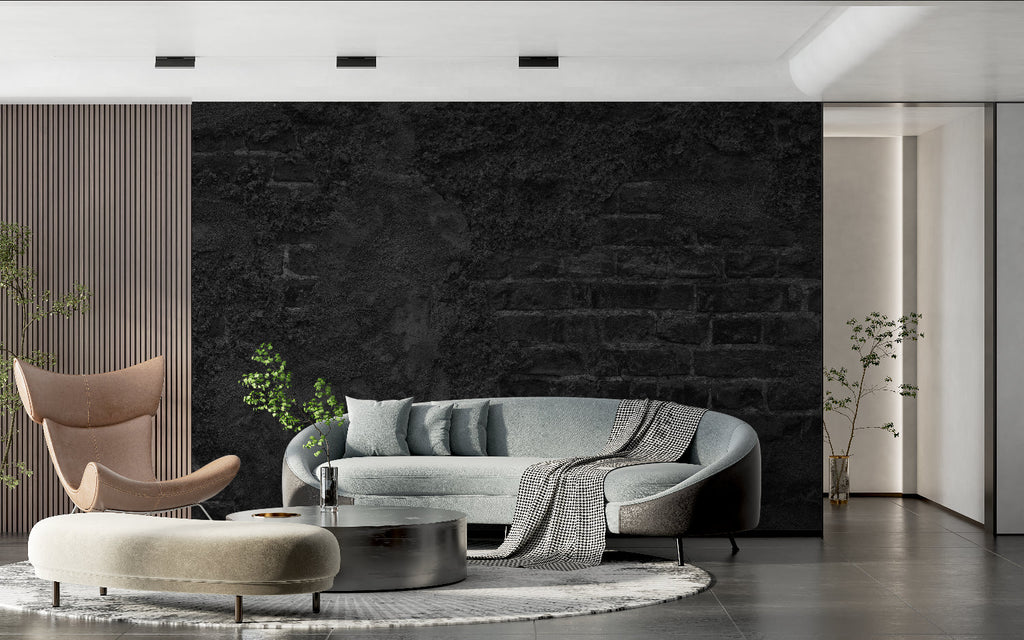 Dark stone textured wallpaper in modern living room with grey sofa and minimal decor