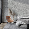 Stone effect wallpaper in modern living room showing grey speckled pattern creating depth