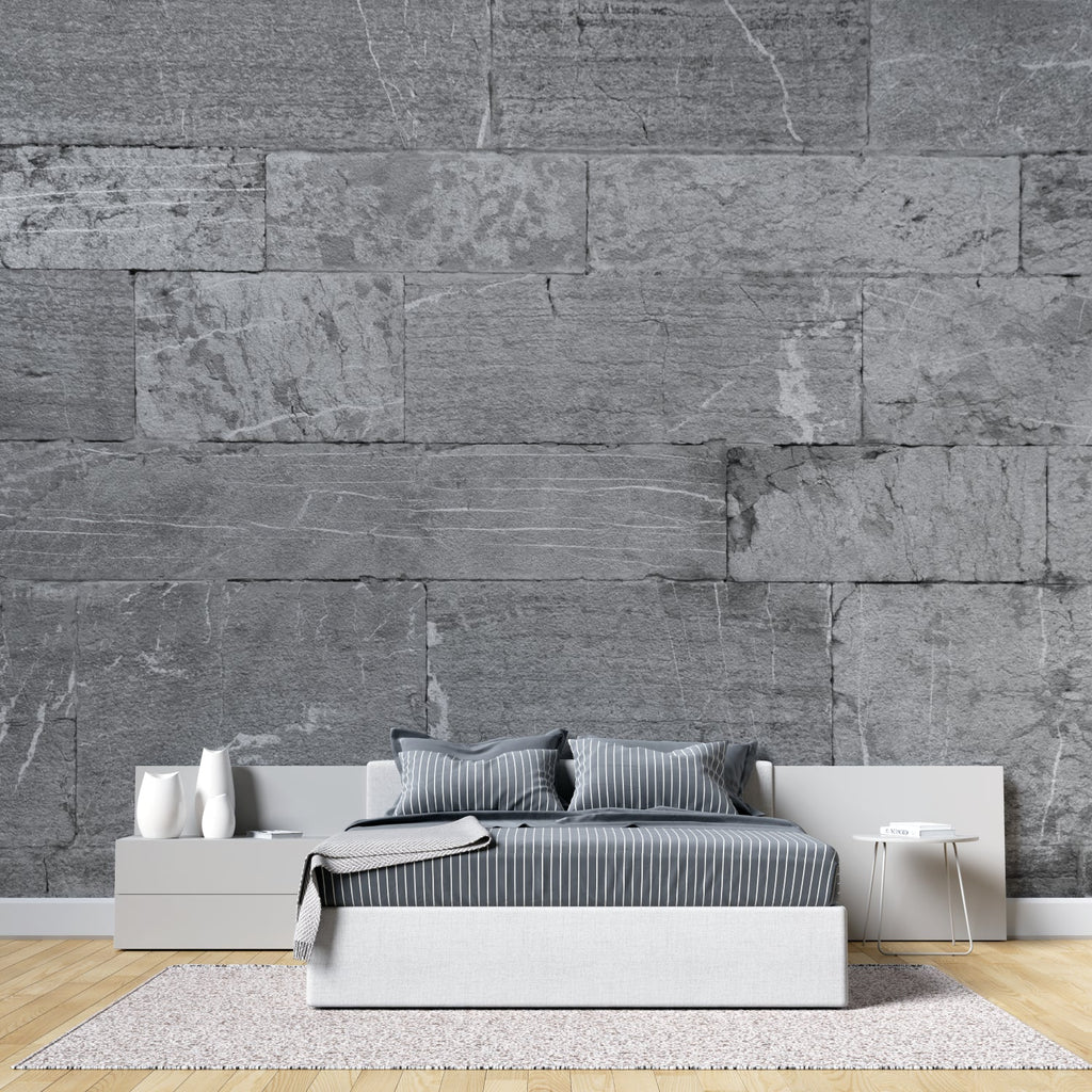 Grey stone block wall mural creating depth in modern bedroom setting