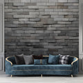 Modern grey stone wall mural in contemporary living room with minimal furniture and natural light