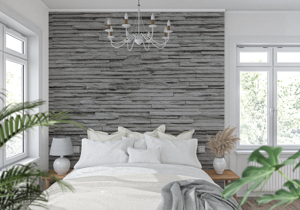 Stone wall mural creating dramatic backdrop in contemporary dining room