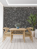 Modern grey stone wallpaper with sparkle effect in a minimalist living room setting