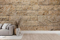 Stone block wallpaper creating a stunning accent wall in a modern living room with beige and natural tones