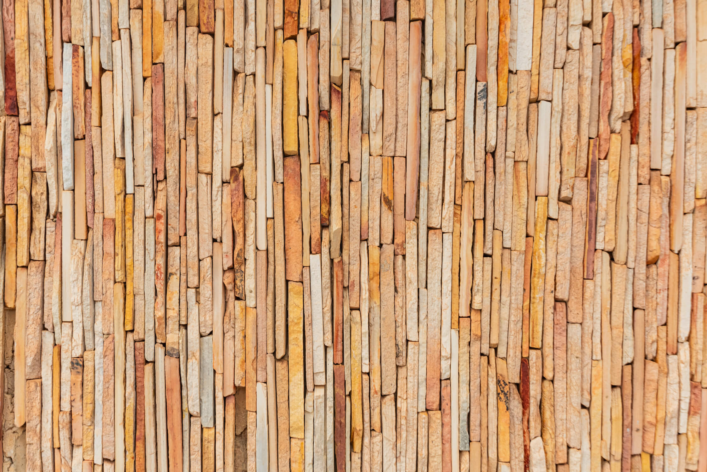 Stone effect wallpaper design file showing full vertical pattern in natural beige tones