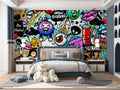 Street art graffiti wallpaper creating bold impact in modern teen bedroom with gaming setup