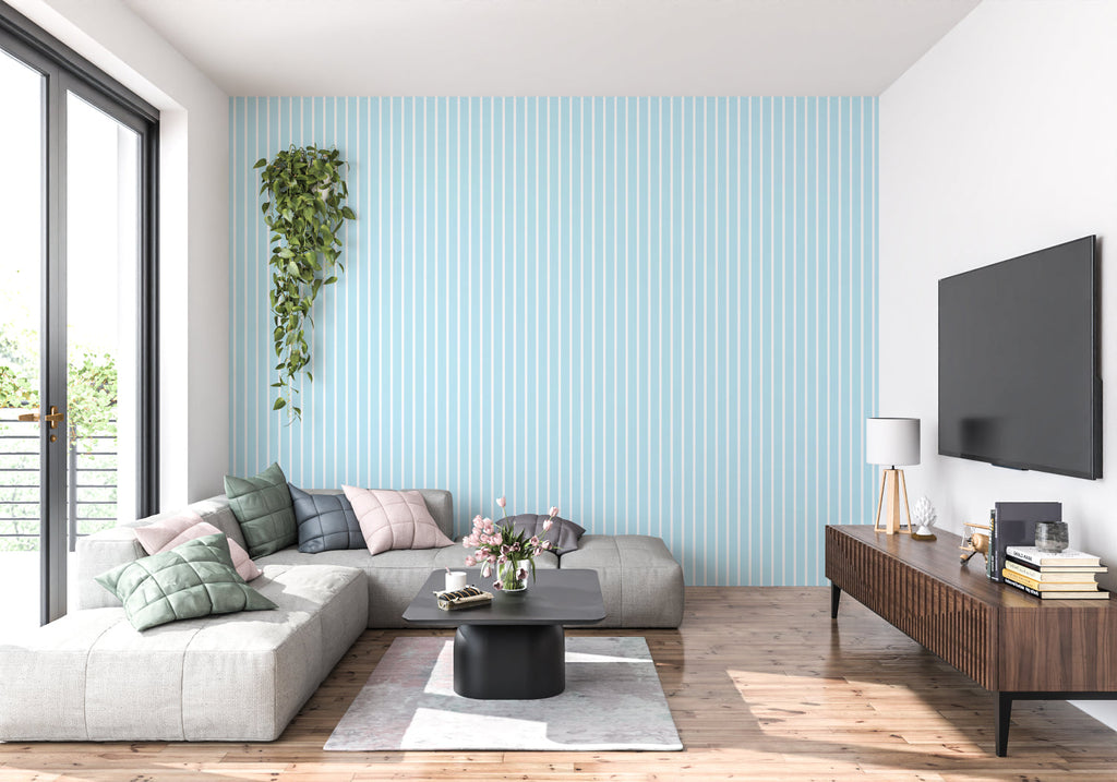 Blue stripe wallpaper installation in hallway demonstrating vertical height effect